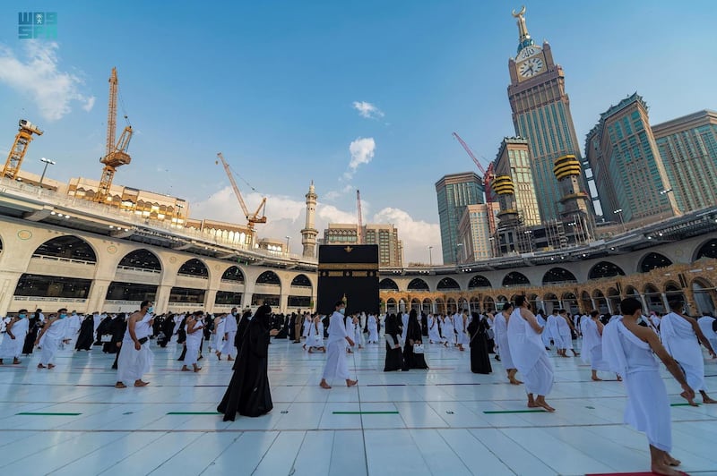 Pilgrims perform tawaf of the Kaaba in compliance with Covid-19 social-distancing norms at the Grand Mosque, in Makkah, Saudi Arabia. SPA