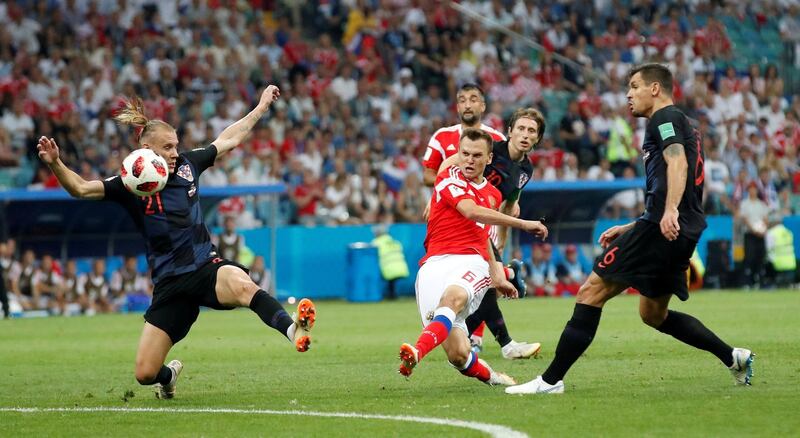 Russia's Denis Cheryshev scores their first goal. Maxim Shemetov/Reuters