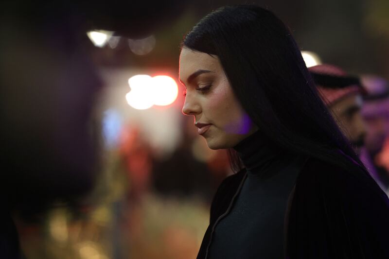 Portuguese footballer Cristiano Ronaldo's partner Georgina Rodriguez arrive at the Mrsool Park Stadium in the Saudi capital Riyadh on January 3, 2023, ahead of Ronaldo's unveiling ceremony as an Al-Nassr player.  (Photo by Fayez Nureldine  /  AFP)