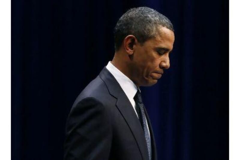 The US president Barack Obama pauses during the event held to remember and support the victims of the mass shooting in Tucson, Arizona. A reader praises his speech as measured, thoughtful and restrained. Jim Young/Reuters