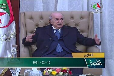 A video grab taken from footage broadcast by Algeria's Canal Algerie 2 on February 12, 2021, shows President Abdelmadjid Tebboune meeting government officials after his return to Algiers after a one-month stay in Germany for surgery following post-Covid-19 complications. AFP