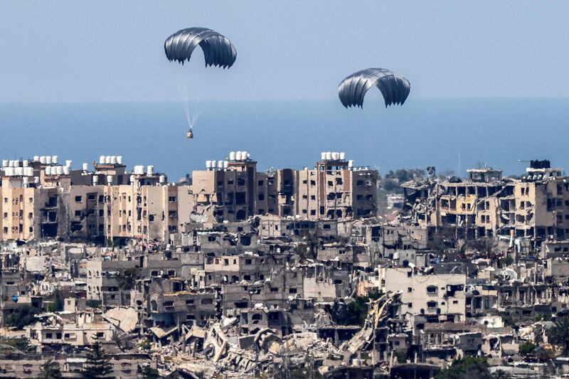 Humanitarian aid is dropped into the Gaza Strip. AFP