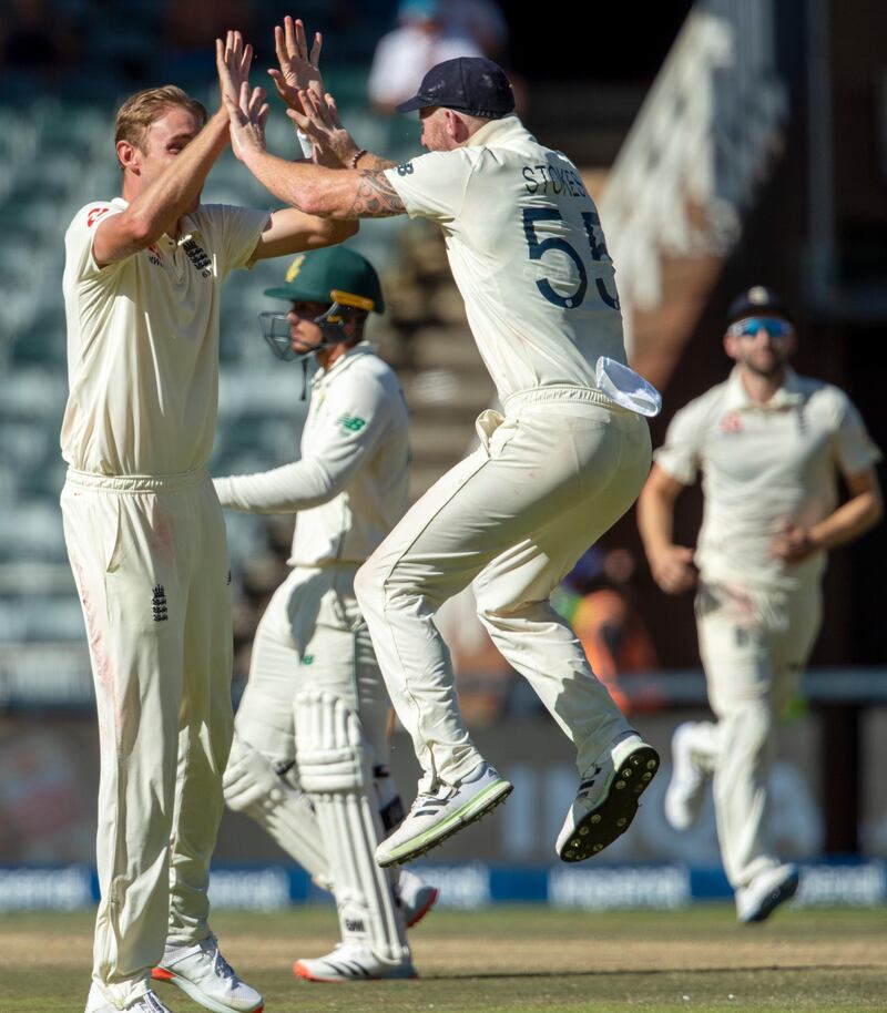 England bowler Stuart Broad, left, celebrates with Ben Stokes after dismissing South Africa's Dwaine Pretorius. AP