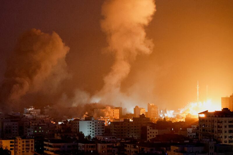 Smoke rises from the Gaza Strip after an Israeli air strike. Reuters