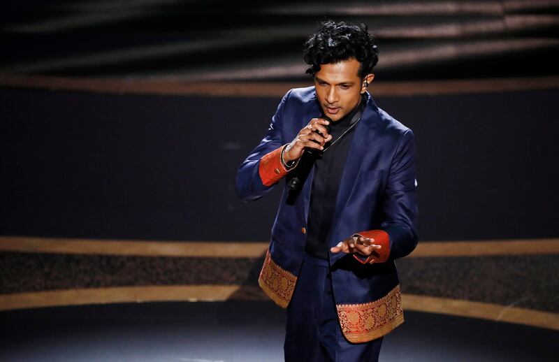 epa08207698 Utkarsh Ambudkar performs during the 92nd annual Academy Awards ceremony at the Dolby Theatre in Hollywood, California, USA, 09 February 2020. The Oscars are presented for outstanding individual or collective efforts in filmmaking in 24 categories.  EPA/ETIENNE LAURENT