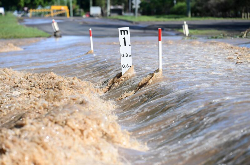 Flood water on a road in Dalby, Queensland. EPA