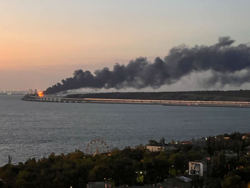 Smoke billows from the bridge. Reuters / Stringer