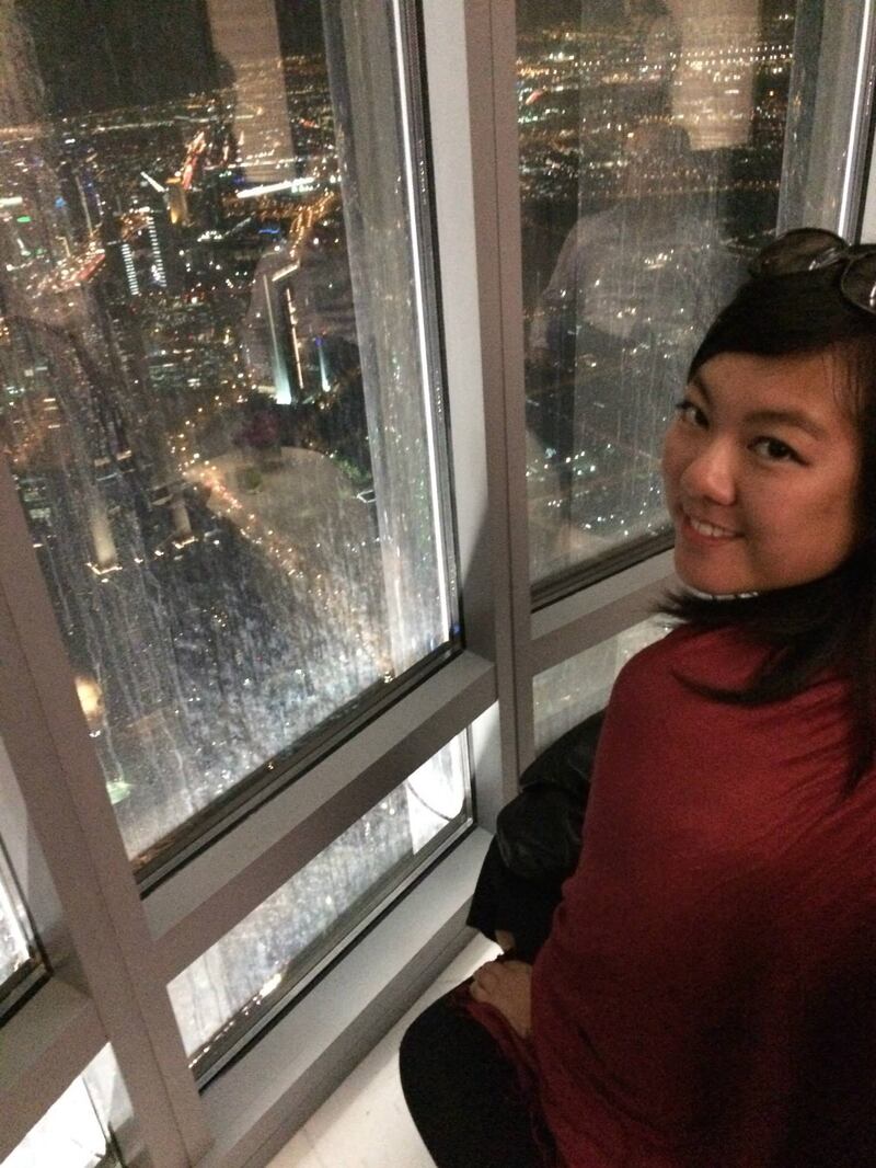 Evelyn Lau at the top of Burj Khalifa in 2015.