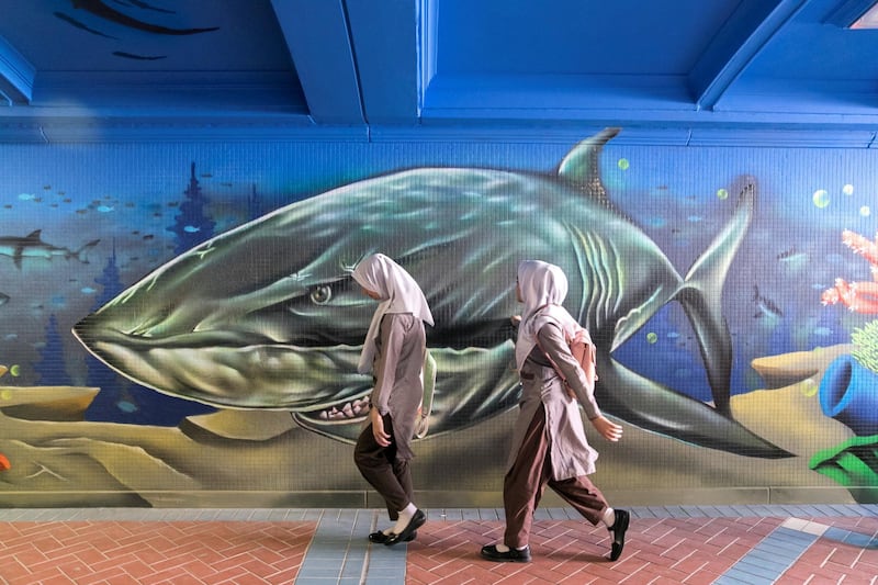 ABU DHABI, UNITED ARAB EMIRATES - JANUARY 31, 2019.

Students walk in a pedestrian tunnel outside Abu Dhabi Science Festival at the corniche in Abu Dhabi.

The event focuses on STEAM subjects (science, technology, engineering, arts and mathematics). Around 200 innovators are displaying their projects at the three host venues over 10 days.

(Photo by Reem Mohammed/The National)

Reporter: GILLIAN DUNCAN
Section:  NA