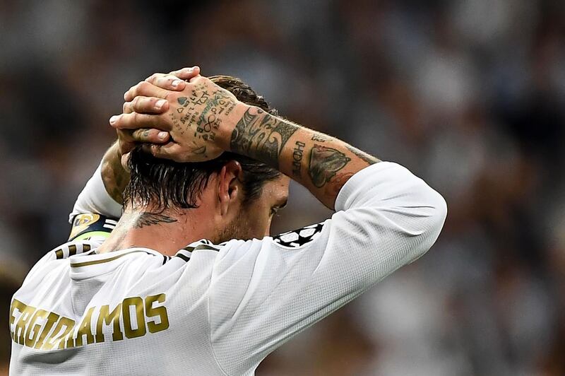 Real Madrid's Spanish defender Sergio Ramos reacts at the end of the UEFA Champions league Group A football match between Real Madrid and Club Brugge at the Santiago Bernabeu stadium in Madrid.  AFP