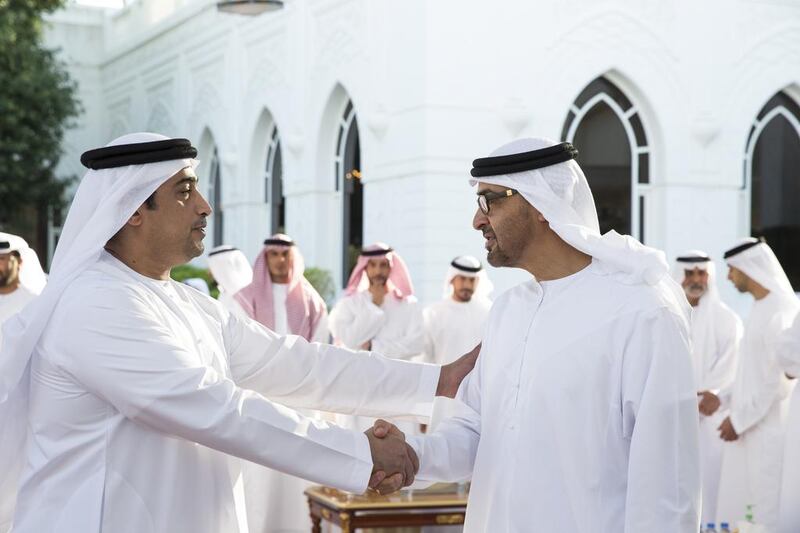 Sheikh Mohammed bin Zayed, Crown Prince of Abu Dhabi and Deputy Supreme Commander of the Armed Forces, greets an Armed Forces servicemen injured while serving the armed forces in Yemen. Seen during a Sea Palace barza. Ryan Carter / Crown Prince Court - Abu Dhabi