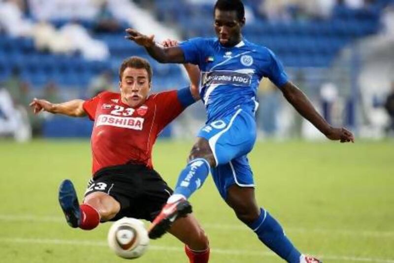 Fifa sided with Al Nasr in their dispute with wayward player Ismael Bangoura, right.