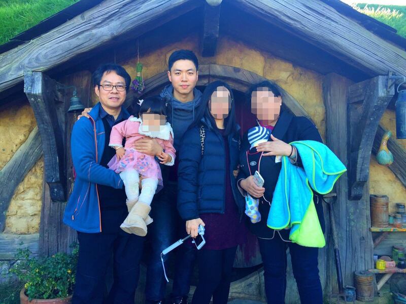 Jie Luo, pictured in 2016 with his father, Hong Xi Luo, and other family members. Photo: Jie Luo