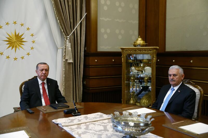 Turkish President Tayyip Erdogan meets with Prime Minister Binali Yildirim in Ankara, Turkey July 19, 2017. Kayhan Ozer/Presidential Palace/Handout via REUTERS ATTENTION EDITORS - THIS IMAGE HAS BEEN SUPPLIED BY A THIRD PARTY. NO RESALES. NO ARCHIVES