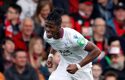 Soccer Football - Premier League - AFC Bournemouth vs Crystal Palace - Vitality Stadium, Bournemouth, Britain - April 7, 2018   Crystal Palace's Wilfried Zaha celebrates scoring their second goal           Action Images via Reuters/Matthew Childs    EDITORIAL USE ONLY. No use with unauthorized audio, video, data, fixture lists, club/league logos or "live" services. Online in-match use limited to 75 images, no video emulation. No use in betting, games or single club/league/player publications.  Please contact your account representative for further details.