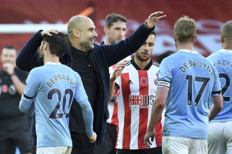 Manchester City's Spanish manager Pep Guardiola reacts at the final whistle during the English Premier League football match between Sheffield United and Manchester City at Bramall Lane in Sheffield, northern England on October 31, 2020. (Photo by Rui Vieira / POOL / AFP) / RESTRICTED TO EDITORIAL USE. No use with unauthorized audio, video, data, fixture lists, club/league logos or 'live' services. Online in-match use limited to 120 images. An additional 40 images may be used in extra time. No video emulation. Social media in-match use limited to 120 images. An additional 40 images may be used in extra time. No use in betting publications, games or single club/league/player publications. / 