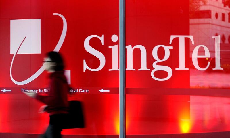 SingTel has created new revenue streams to enhance its average revenue per user. Munshi Ahmed / Bloomberg News