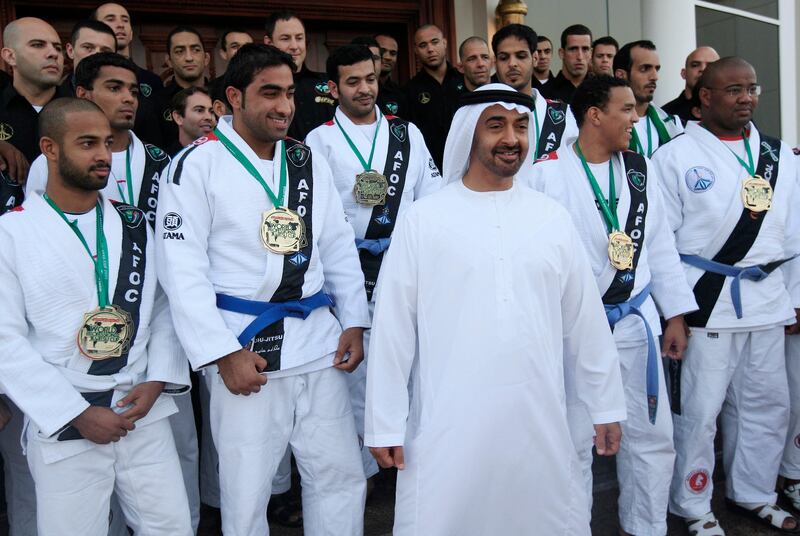 ABU DHABI, UNITED ARAB EMIRATES - May 4, 2009: (centre) General Sheikh Mohammed bin Zayed Al Nahyan, Crown Prince of Abu Dhabi and Deputy Supreme Commander of the UAE Armed Forces, received the UAE Jiu-Jitsu team and coaches at the Sea Palace to recognize their efforts in the recent tournament they hosted in Abu Dhabi.
( Ryan Carter / The National ) *** Local Caption ***  RC004-Jiu-Jitsu.JPGRC004-Jiu-Jitsu.JPGRC004-Jiu-Jitsu.JPG