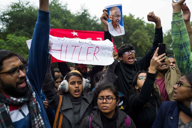 Demonstrators shout slogans in New Delhi. AFP