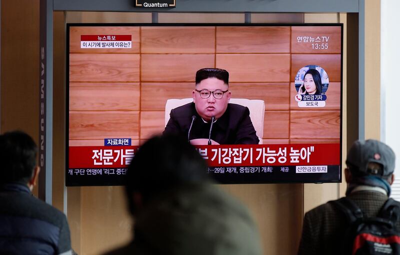 People watch a news programme reporting Pyongyang firing projectiles in Seoul, South Korea. AP