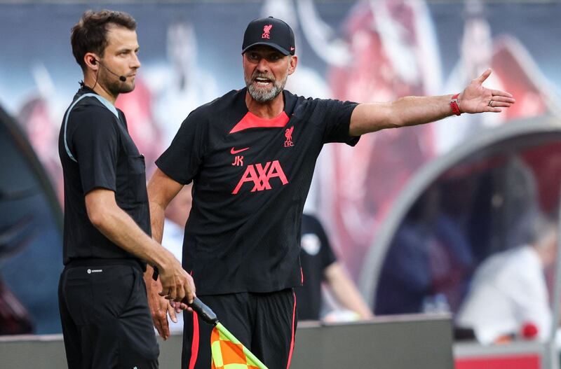 Liverpool manager Jurgen Klopp complains to the linesman. AFP