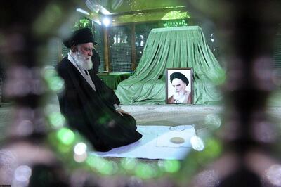 Iran's Supreme Leader Ayatollah Ali Khamenei pray next to the grave of Imam Iran's late founder of Islamic Revolution Ayatollah Ruhollah Khomeini, on the occasion of the anniversary of Khoemeini's return to Iran, in Tehran, Iran February 1, 2020. Official Khamenei website/Handout via REUTERS ATTENTION EDITORS - THIS IMAGE WAS PROVIDED BY A THIRD PARTY. NO RESALES. NO ARCHIVES