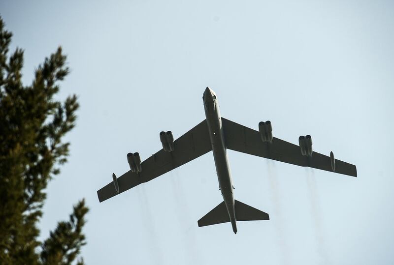 A B-52 bomber from North Dakota does a flyby for the Centennial anniversary of the creation of the La Fayette Escadrille at the Escadrille Memorial in Marnes-la-Coquette, France.  AFP