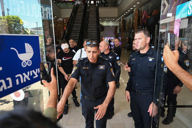 The attack took place in a mall in Karmiel, northern Israel. AP