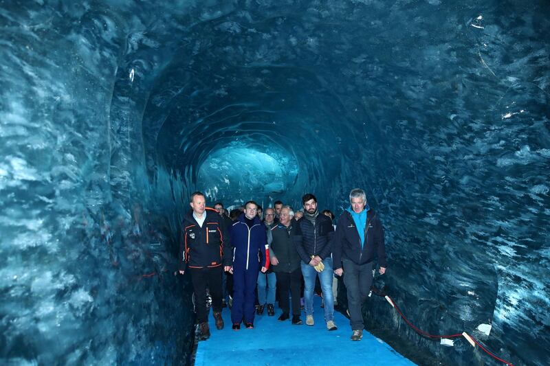 French President Emmanuel Macron, accompanied by Compagnie du Mont-Blanc CEO Mathieu Dechavanne and glaciologist Luc Moreau, visits the "Mer de Glace", France's largest glacier, which has shrunk dramatically in recent years, in Chamonix, France. Reuters