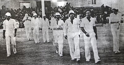 The Pakistan side, led by Javed Miandad, takes the field during a match between Gavaskar XI and Miandad XI at Sharjah Cricket Stadium, April 3 1981. Courtesy: The Cricketer Pakistan