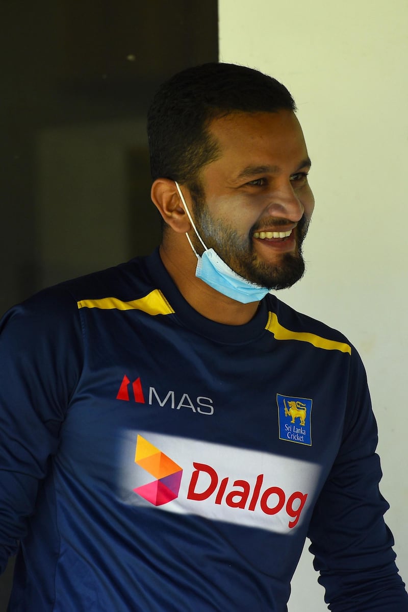 Sri Lanka's cricket captain Dimuth Karunaratne arrives for a practice session. AFP