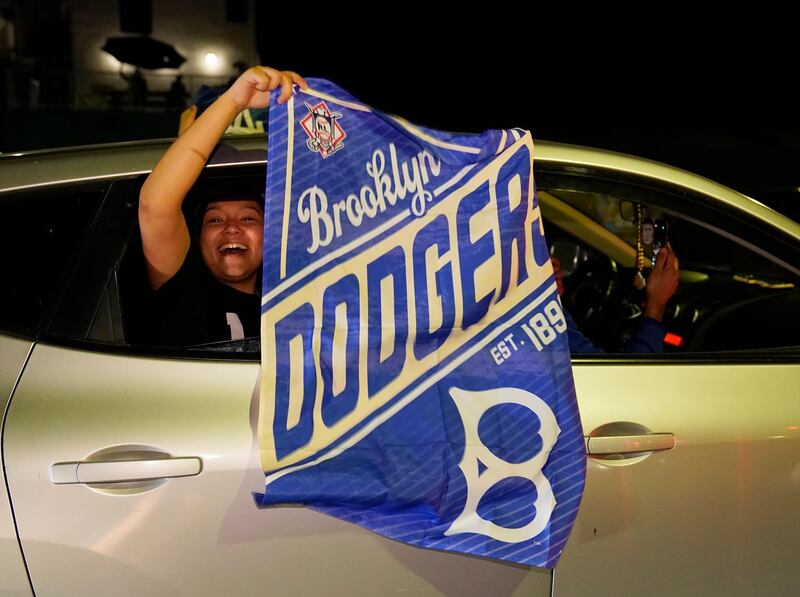 Los Angeles Dodgers fans celebrate on Sunset Blvd. AP