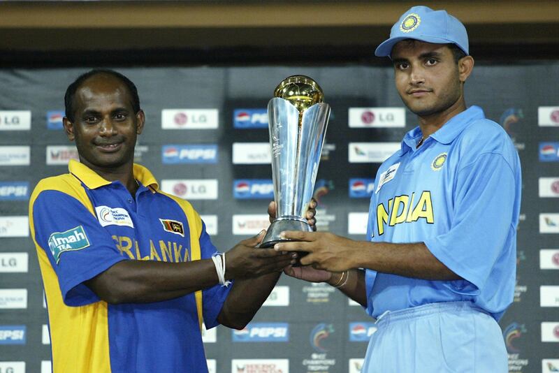 COLOMBO - SEPTEMBER 30:  Sanath Jayasuriya of Sri Lanka and Sourav Ganguly of India with the trophy after the re-scheduled ICC Champions Trophy final between Sri Lanka and India at the R. Premadasa Stadium in Colombo, Sri Lanka on September 30, 2002. (Photo by Clive Mason/Getty Images)  India and Sri Lanka share the ICC Champions Trophy after the rain washed out play. 
