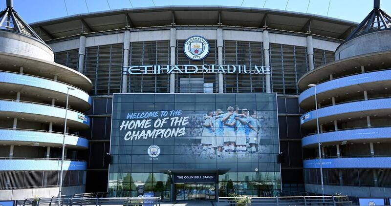  (FILES) In this file photo taken on April 21, 2020 the Etihad Stadium complex, home to English Premier League football team Manchester City, is pictured in Manchester, northern England, as life in Britain continues during the nationwide lockdown to combat the novel coronavirus pandemic. Premier League clubs will meet on May 1, 2020, to discuss whether it is realistic to complete the season as Manchester City striker Sergio Aguero admitted players are scared at being rushed back into action.  / AFP / Paul ELLIS
