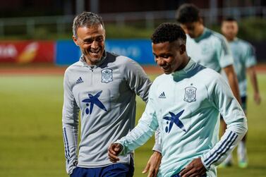 epa08637984 A handout picture made available by the Spanish Royal Football Federation (RFEF) shows Spain's National soccer team head coach Luis Enrique (L) and player Ansu Fati (R) during the team's training session in Madrid, Spain, 31 August 2020. Spain faces Germany on 03 September 2020 in a UEFA Nations League match. EPA/PABLO GARCIA/RFEF/HO HANDOUT EDITORIAL USE ONLY/NO SALES