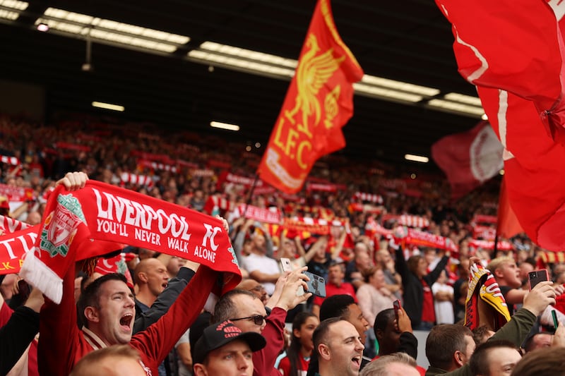 Liverpool fans cheer on the team from the Anfield stands.Getty Images