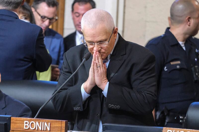 Los Angeles City Council member Mike Bonin pauses while speaking to his supporters before starting the meeting on Tuesday. AP