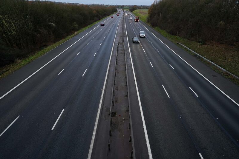 Motorists drive along a quiet M40 motorway on Monday morning near Warwick. PA