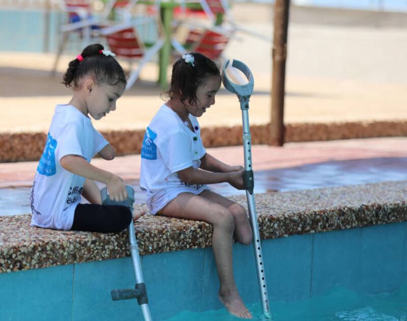 Palestinian children swim in a pool at a summer camp organised by Palestine Children's Relief Fund in Gaza City, Gaza on August 02, 2021. Anadolu Agency via Getty