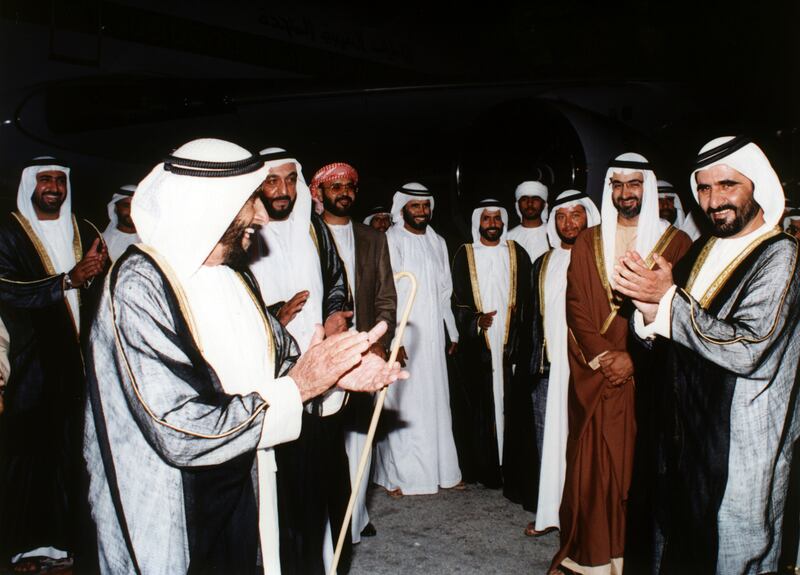 Sheikh Zayed Bin Sultan Al Nahyan being welcomed by Sheikh Khalifa Bin Zayed Al Nahyan, Sheikh Mohammed Bin Rashid Al Maktoum, Sheikh Mohammed Bin Zayed Al Nahyan and Sheikh Sultan Bin Zayed Al Nahyan upon his return to the UAE, 5th September 1995
National Archives images supplied by the Ministry of Presidential Affairs to mark the 50th anniverary of Sheikh Zayed Bin Sultan Al Nahyan becaming the Ruler of Abu Dhabi. *** Local Caption ***  86 b.jpg