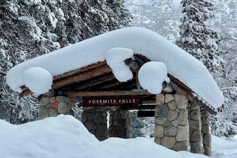 Yosemite National Park, closed due to heavy snow, postponed its planned March 2 reopening indefinitely. AP