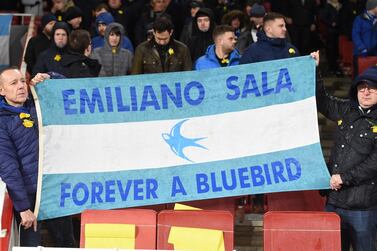 Cardiff City supporters display tributes for Argentine striker Emiliano Sala, who went missing on January 21, 2019 after a light aircraft he was travelling in disappeared over the English Channel. EPA
