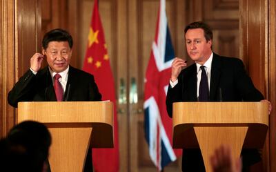 Xi Jinping and David Cameron at a press conference in Downing Street, London, in 2015. Getty Images
