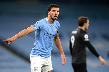 MANCHESTER, ENGLAND - NOVEMBER 28: Ruben Dias of Manchester City reacts during the Premier League match between Manchester City and Burnley at Etihad Stadium on November 28, 2020 in Manchester, England. Sporting stadiums around the UK remain under strict restrictions due to the Coronavirus Pandemic as Government social distancing laws prohibit fans inside venues resulting in games being played behind closed doors. (Photo by Michael Regan/Getty Images)