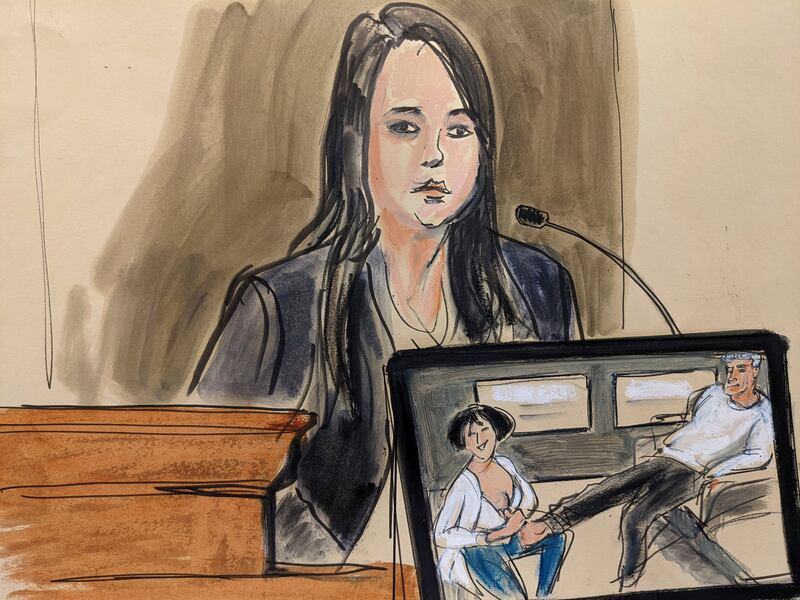 In a courtroom sketch, FBI analyst Kimberly Meder testifies during Ghislaine Maxwell's sex-abuse trial about a photo, shown on video, of Maxwell massaging Epstein's foot at his home. AP