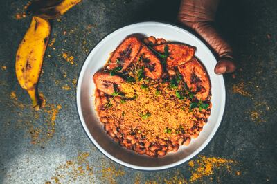 Red green red, a dish available at Alkebulan, includes black-eyed peas and palm oil stew, served with plantains, farofa and fresh avocado. Photo: Alkebulan African Dining Hall