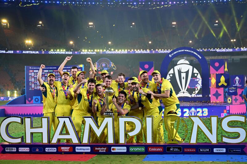 Australia's players celebrate after their six-wicket win over India in the World Cup final match at the Narendra Modi Stadium in Ahmedabad on November 19, 2023. AFP
