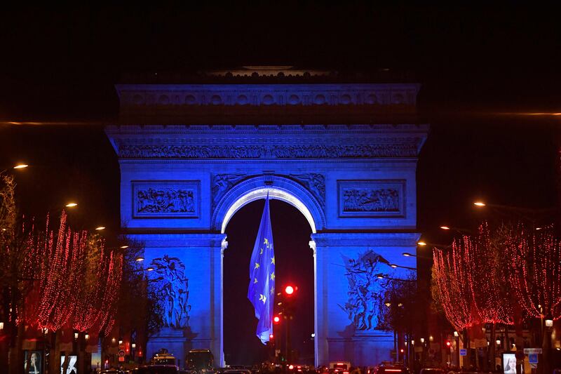 The EU's blue-and-yellow colours decorate the Arc de Triomphe in Paris on New Year's Day. Photo: AFP