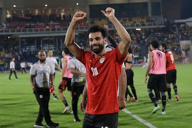 Egypt's Mohamed Salah, celebrates at the end of the African Cup of Nations 2022 quarter-final soccer match between Egypt and Morocco at the Ahmadou Ahidjo stadium in Yaounde, Cameroon, Sunday, Jan.  30, 2022.  (AP Photo / Sunday Alamba)