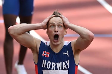 TOKYO, JAPAN - AUGUST 03: Karsten Warholm of Norway reacts after winning the gold medal in the Men's 400m Hurdles Final during the Tokyo 2020 Olympic Games at Olympic Stadium in Tokyo, Japan on August 03, 2021. (Photo by Mustafa Yalcin / Anadolu Agency via Getty Images)